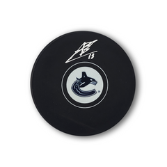 Arshdeep Bains Autographed Vancouver Canucks Hockey Puck