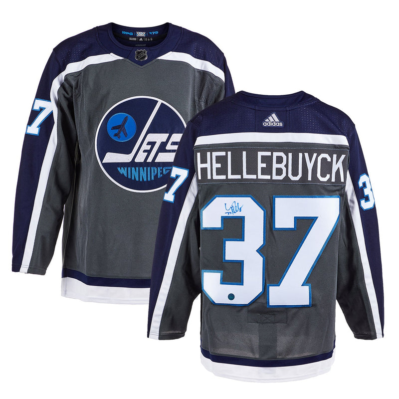 Load image into Gallery viewer, Connor Hellebuyck Signed Winnipeg Jets Reverse Retro adidas Jersey

