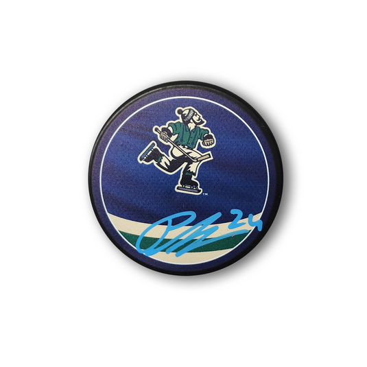 Pius Suter Autographed Vancouver Canucks Reverse Retro Hockey Puck