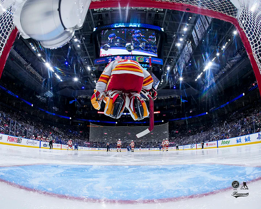 Pre-Order - Dustin Wolf Autographed Calgary Flames Jumping Away 8x10 Photo