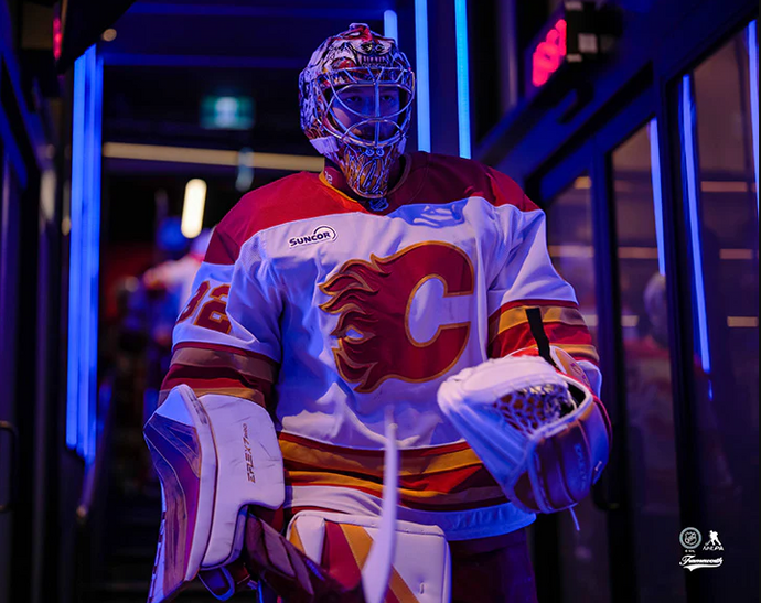 Pre-Order - Dustin Wolf Autographed Calgary Flames Entrance 8x10 Photo